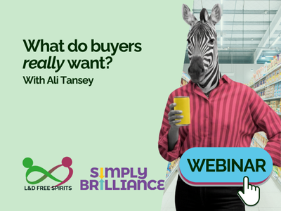 A quirky promotional image for an L&D Free Spirits webinar featuring a person with a zebra’s head wearing a red shirt and holding a yellow drink, standing in a supermarket aisle. The text reads “What do buyers really want? With Ali Tansey.” Logos for L&D Free Spirits and Simply Brilliance appear below, alongside a large blue “Webinar” button with a cursor icon.